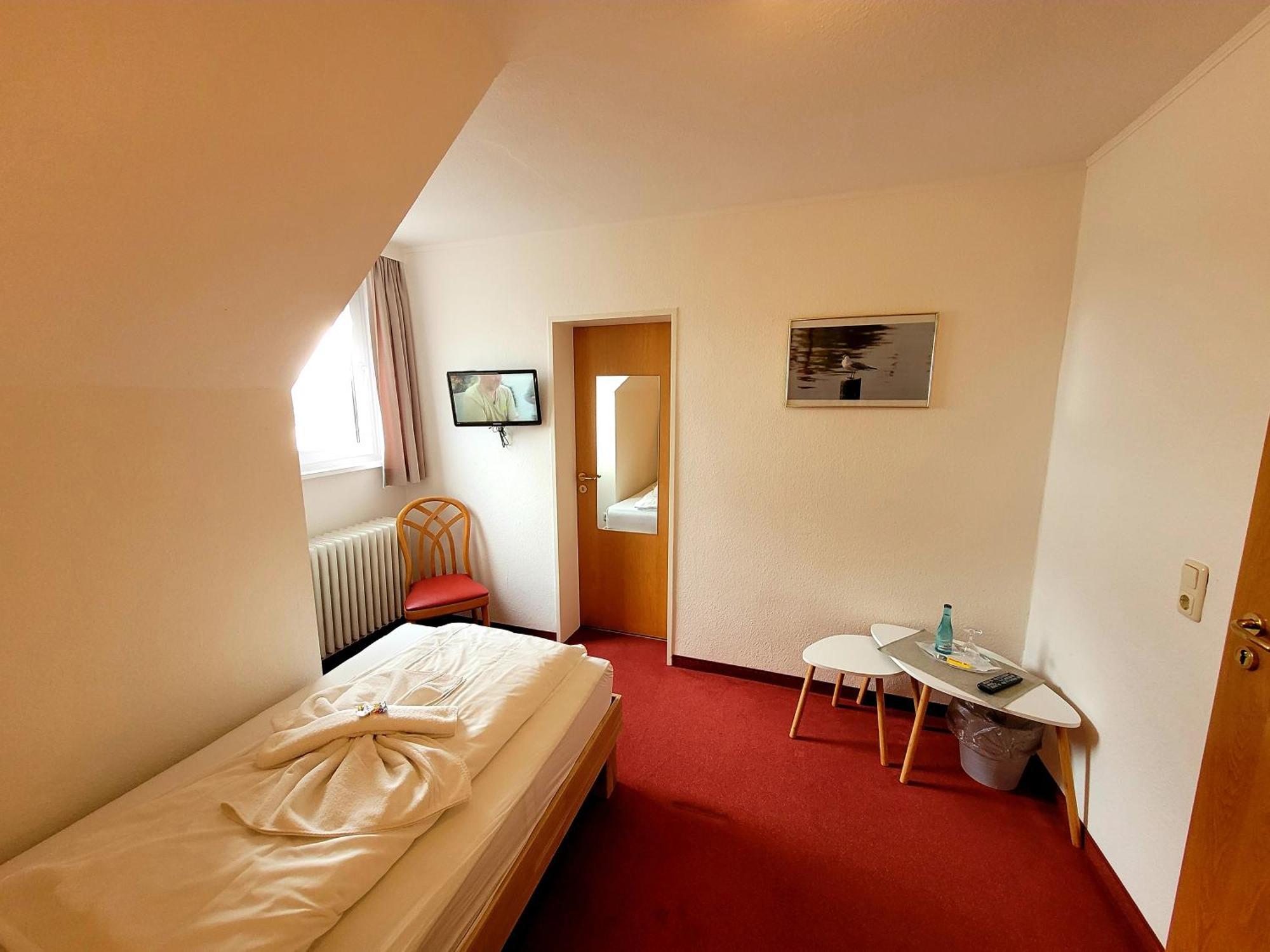 Hotel An'T Yachthaven Harlesiel Habitación foto